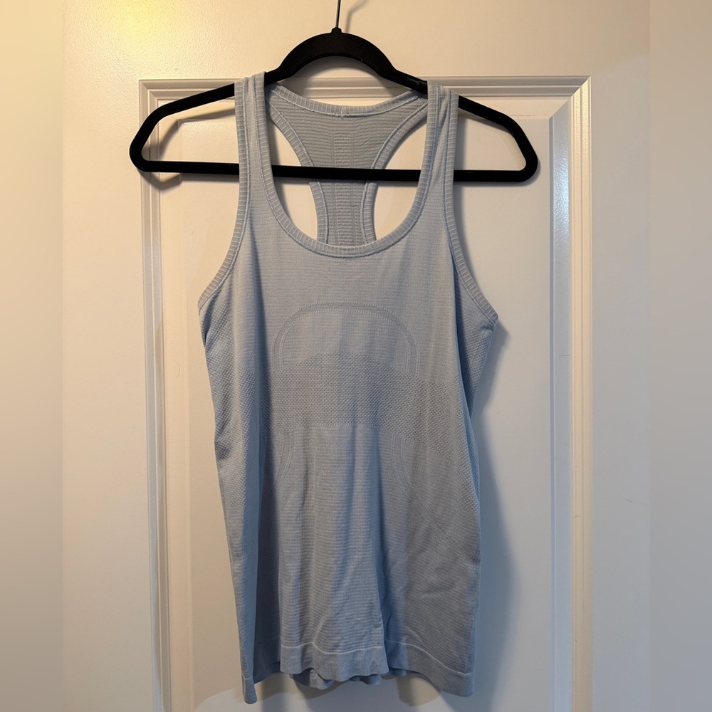 Lululemon Swiftly Tech Racerback
Tank Top Hip Length in Light Blue, size 6